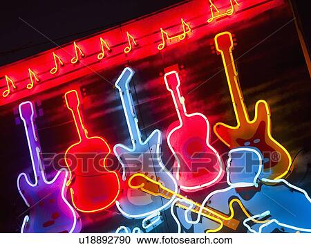 Illuminated guitars on Beale Street in Memphis View Large Photo Image Stock Image - Illuminated guitars on Beale Street in Memphis. Fotosearch