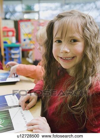 Kindergarten student in classroom View Large Photo Image Stock Image - Kindergarten student in classroom. Fotosearch