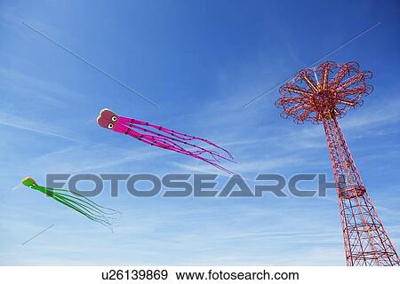 Kites and amusement park ride View Large Photo Image Stock Photo - Kites and amusement park ride. Fotosearch