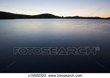 Lake at twilight View Large Photo Image Stock Image - Lake at twilight. Fotosearch