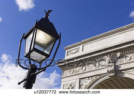 Lamp post in front of Washington Square arch View Large Photo Image Stock Image - Lamp post in front of Washington Square arch. Fotosearch