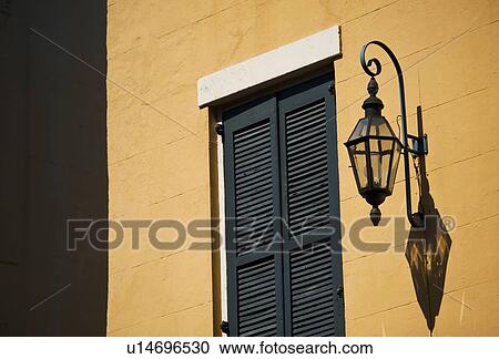 Stock Image - Lantern on exterior of building. Fotosearch