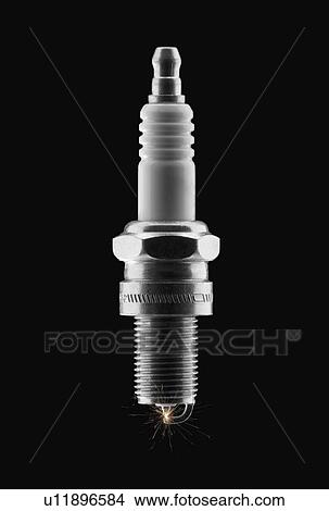 Lit spark plug View Large Photo Image Picture - Lit spark plug. Fotosearch