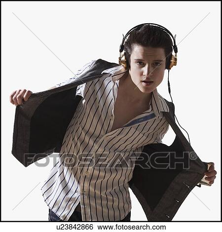 Male dancer listening to music on mp3 player View Large Photo Image Stock Photograph - Male dancer listening to music on mp3 player. Fotosearch
