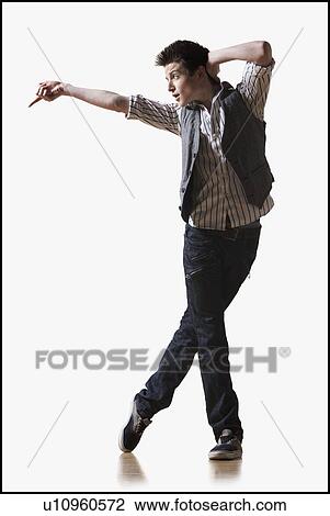 Stock Image - Male dancer performing lyrical dance. Fotosearch