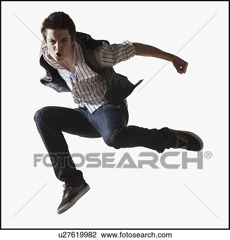 Stock Image - Male dancer performing lyrical dance. Fotosearch