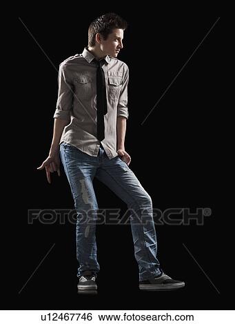 Stock Photograph - Male dancer posed for a lyrical dance. Fotosearch