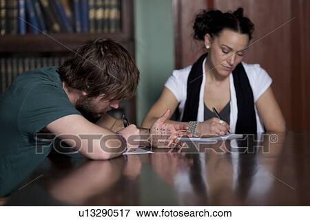 Man cheating at a test at school View Large Photo Image Stock Photo - Man cheating at a test at school. Fotosearch