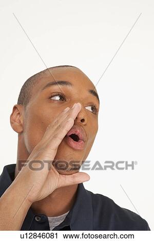 Stock Image - Man yelling. Fotosearch