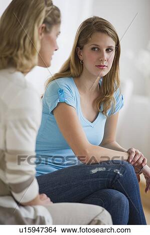 Mother and daughter having an argument View Large Photo Image Picture - Mother and daughter having an argument. Fotosearch