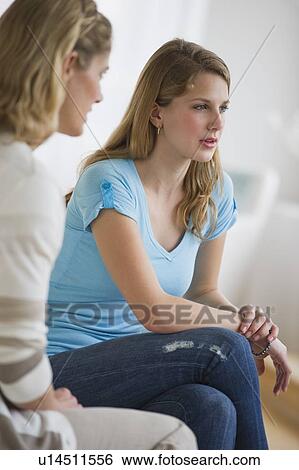 Stock Photograph - Mother and daughter having an argument. Fotosearch