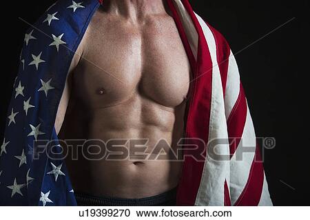 Muscular man wearing American flag as a cape View Large Photo Image Stock Image - Muscular man wearing American flag as a cape. Fotosearch