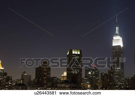 Stock Image - New York City skyline at dusk. Fotosearch