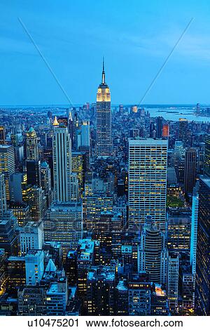 Stock Image - New York City skyline at sunset. Fotosearch