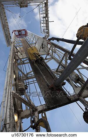 Oil drilling rig View Large Photo Image Stock Photograph - Oil drilling rig. Fotosearch