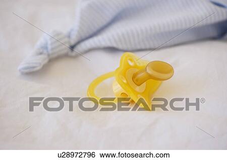 Stock Photograph - Pacifier and security blanket. Fotosearch