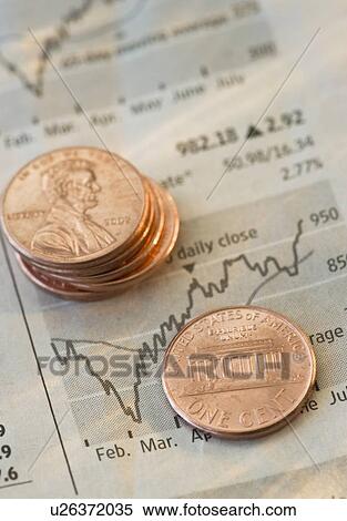Stock Photography - Pennies on a graph. Fotosearch