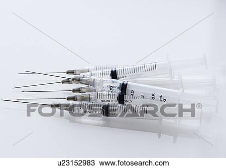 Stock Image - Pile of syringes. Fotosearch