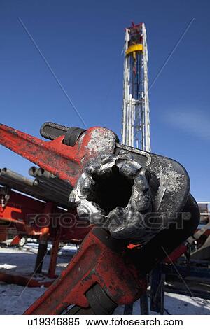 Stock Photography - Pipe wrench on oil drilling rig. Fotosearch
