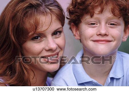Portrait of a mother an her cute red headed son View Large Photo Image Stock Image - Portrait of a mother an her cute red headed son. Fotosearch