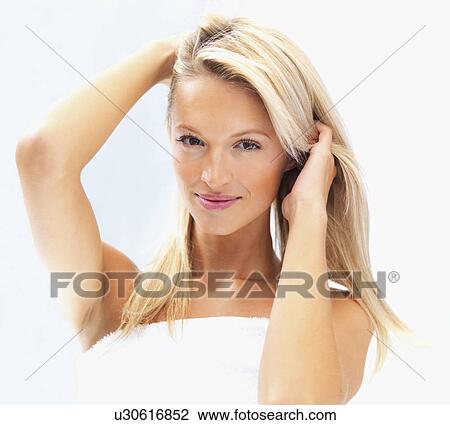 Pretty blond woman wearing a towel View Large Photo Image Stock Image - Pretty blond woman wearing a towel. Fotosearch