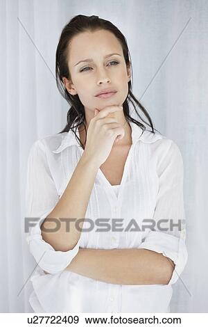 Pretty woman deep in thought View Large Photo Image Stock Photo - Pretty woman deep in thought. Fotosearch