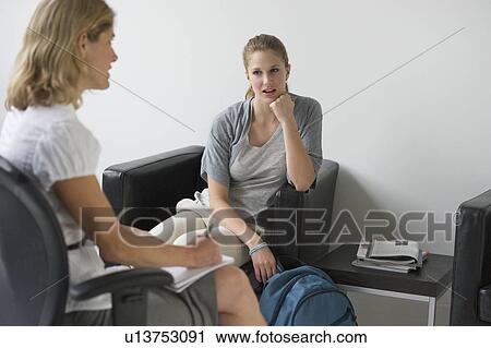 Psychiatrist and patient in counseling session View Large Photo Image Stock Image - Psychiatrist and patient in counseling session. Fotosearch