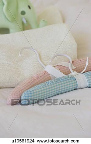 Picture - Quilted hangers baby blanket and stuffed elephant. Fotosearch
