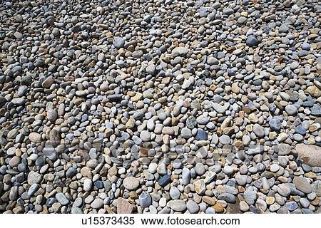Rocks on the beach View Large Photo Image Stock Photography - Rocks on the beach. Fotosearch