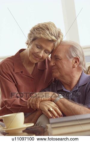 Senior couple embracing View Large Photo Image Stock Image - Senior couple embracing. Fotosearch
