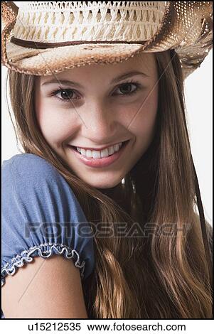 Smiling cowgirl View Large Photo Image Stock Photography - Smiling cowgirl. Fotosearch