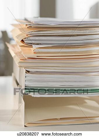Stock Photo - Stack of paperwork. Fotosearch