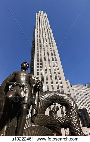 Stock Image - Statue in front of Rockefeller Center. Fotosearch