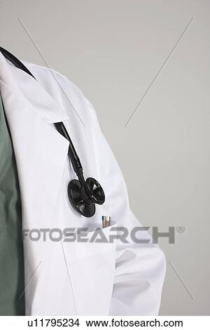 Picture - Stethoscope on Doctor's lab coat. Fotosearch