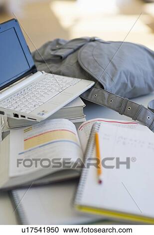Stock Image - Student's homework. Fotosearch
