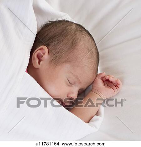 Swaddled infant View Large Photo Image Picture - Swaddled infant. Fotosearch