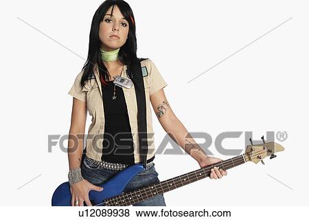 Teenage girl playing electric guitar View Large Photo Image Stock Photo - Teenage girl playing electric guitar. Fotosearch