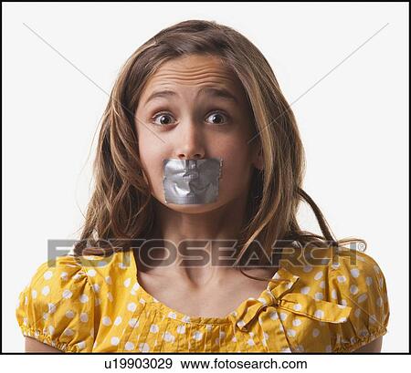 Teenage girl with duct tape on her mouth View Large Photo Image Stock Photo - Teenage girl with duct tape on her mouth. Fotosearch
