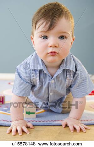 Toddler playing with blocks View Large Photo Image Stock Photo - Toddler playing with blocks. Fotosearch