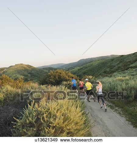 Trail runners View Large Photo Image Stock Photo - Trail runners. Fotosearch