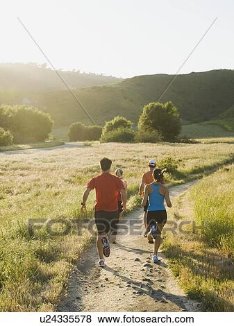 Trail runners View Large Photo Image Stock Photo - Trail runners. Fotosearch