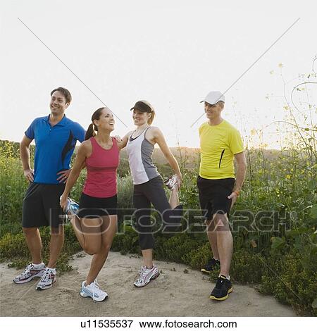 Stock Photo - Trail runners stretching. Fotosearch