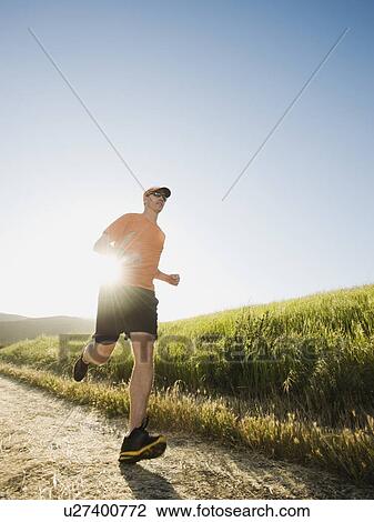 Stock Image - Trail running. Fotosearch