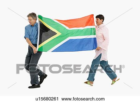 Two people carrying the South African flag View Large Photo Image Stock Image - Two people carrying the South African flag. Fotosearch