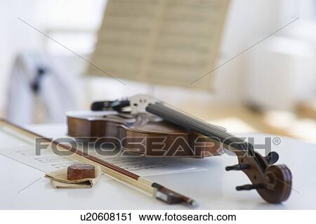 Stock Image - Violin and sheet music. Fotosearch