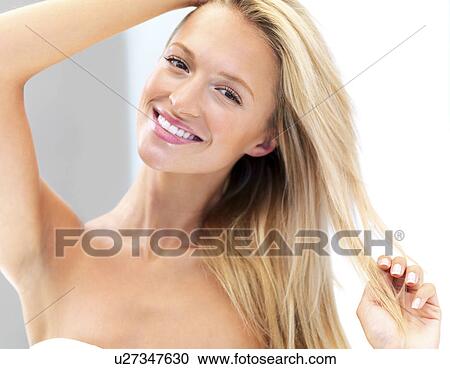 Stock Image - Woman wearing a towel. Fotosearch