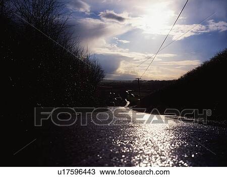 Stock Image - Country Road After Rain Near Moynalty, Co Meath, Ireland. Fotosearch