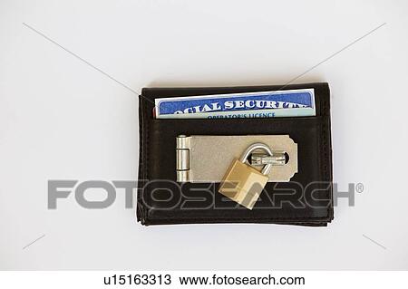 lock on a wallet with a united states social security card and driver's license visible View Large Photo Image Stock Image - lock on a wallet with a united states social security card and driver's license visible. Fotosearch