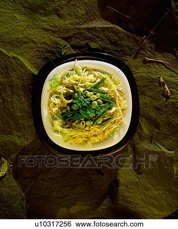 Stock Photograph - Oriental Salad With Mixed Leaves And Asparagus. Fotosearch