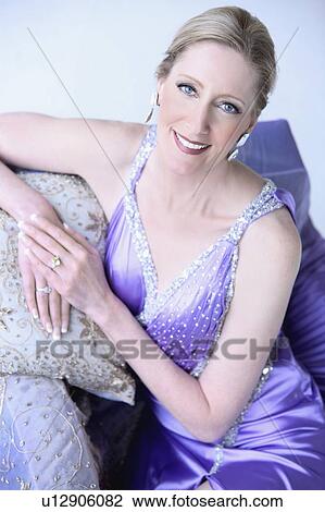 portrait of a woman in an evening gown View Large Photo Image Stock Image - portrait of a woman in an evening gown. Fotosearch